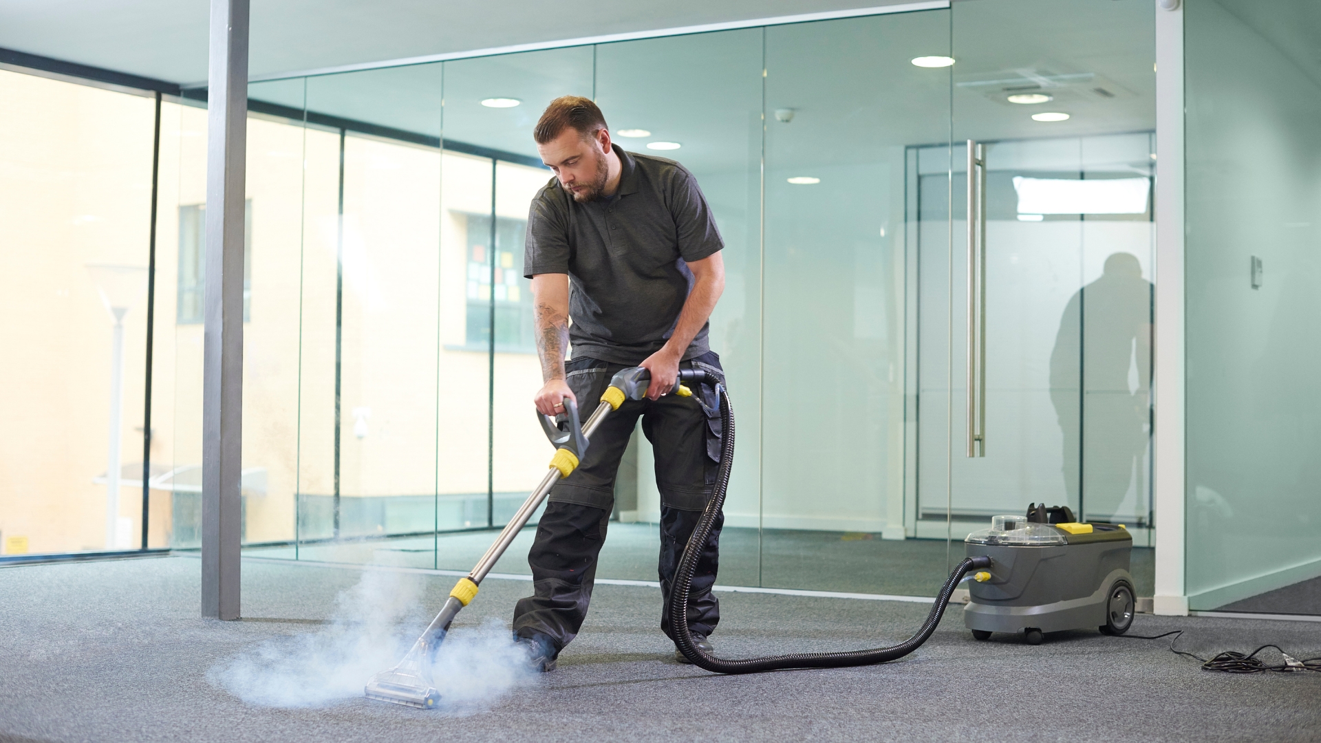 Deep steam cleaning an office carpet for a fresh and hygienic workspace.